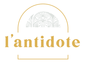 Logo doré de l'Antidote : restaurant, caviste et bar à Vannes